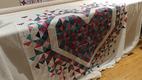 Heart quilt with quarter square triangles