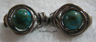Top view of Twice around the world (TAW) wire wrap ring
