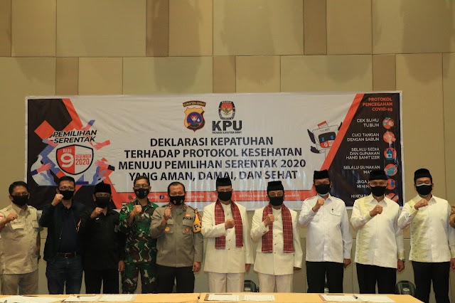 Dukung Protokol Kesehatan setiap Tahapan Pilkada, Polda Sumbar Bagikan Ratusan Ribu Masker