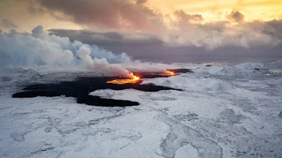 Lava flows from Iceland volcano slow after heavy snow