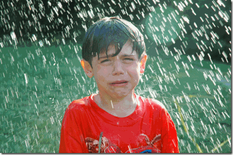 Little-Boy-Who-didnt-buy-an-Eddie-Bauer-Umbrella-He-got-caught-in-the-rain