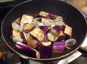 eggplant cooking in pan