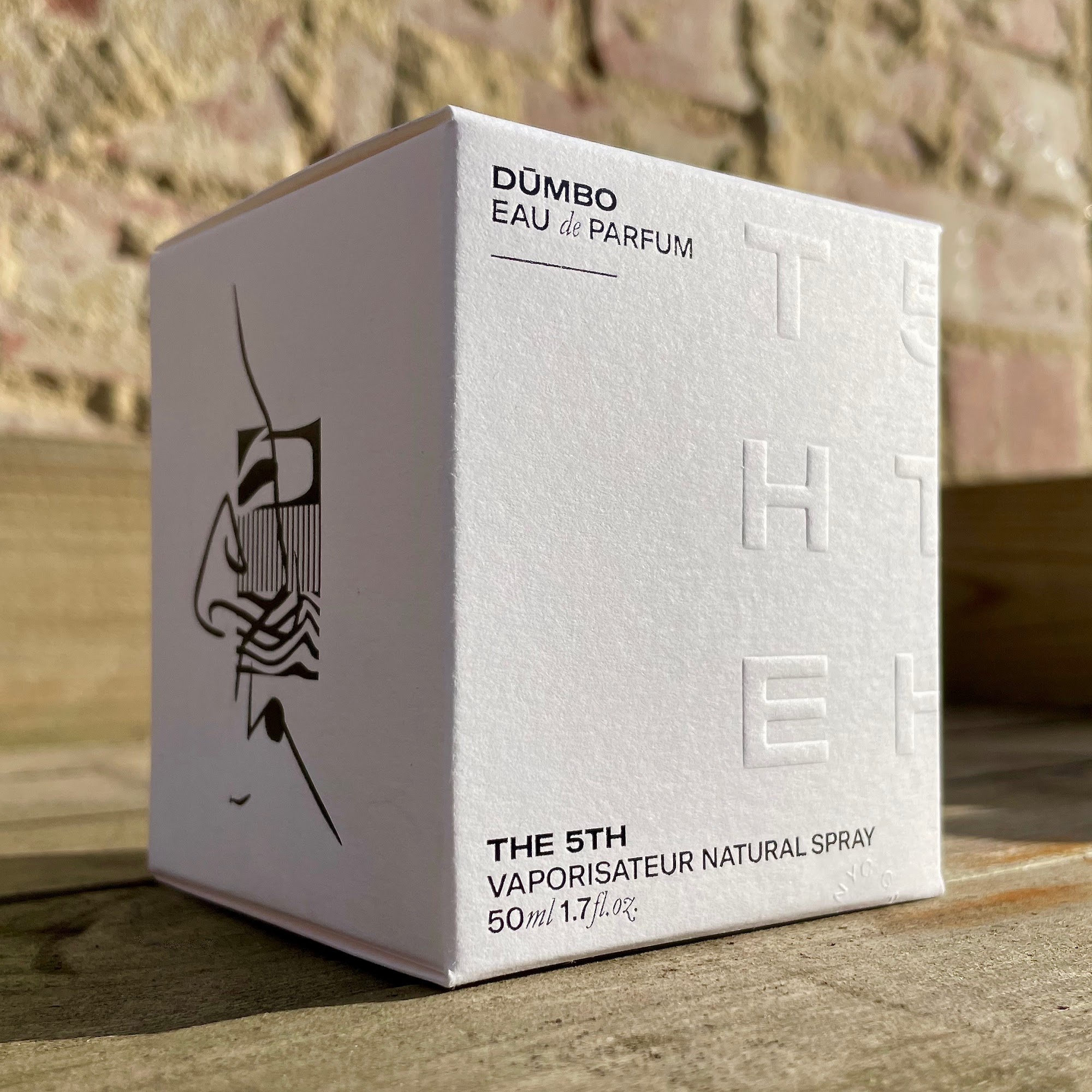 DŪMBO perfume bottle box from the company called THE 5TH