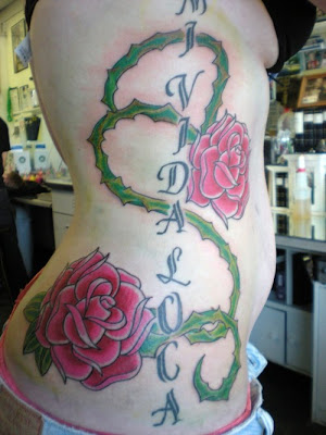 Rose flower tattoo design on side women Rose Flower Tattoo Design On Side 