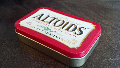 Photograph of an Altoids tin at an oblique angle