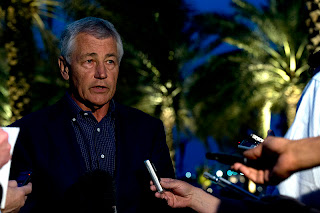 Chuck Hagel briefs the press in Abu Dhabi 