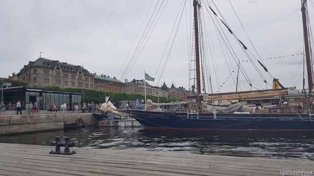 views of Strandvägen from a bench in a ferry pier.