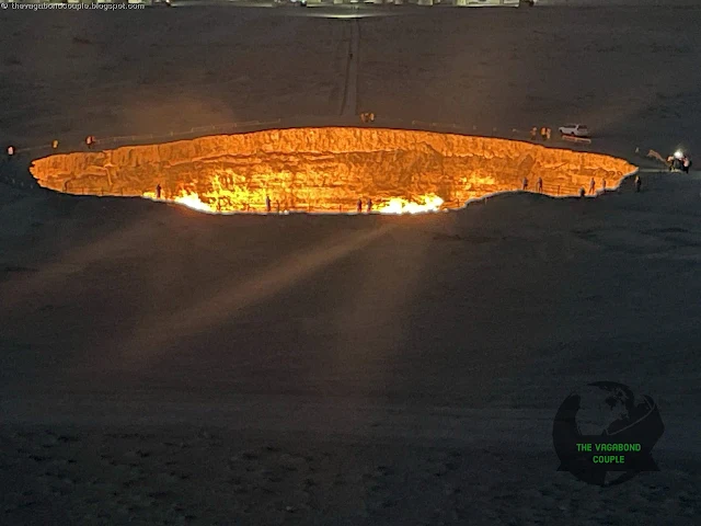 Darvaza Gas Crater - Door to Hell with visitors around its rim