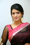 Nidhi Natuiyal Glamorous Photos in Saree-thumbnail-24