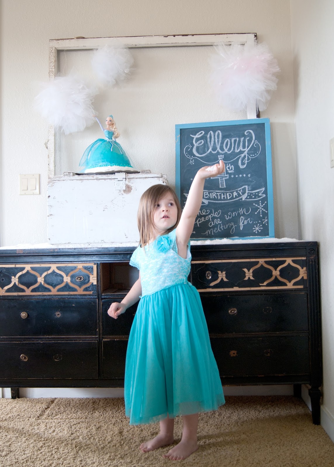 The birthday girl and the party decor - Frozen themed birthday party