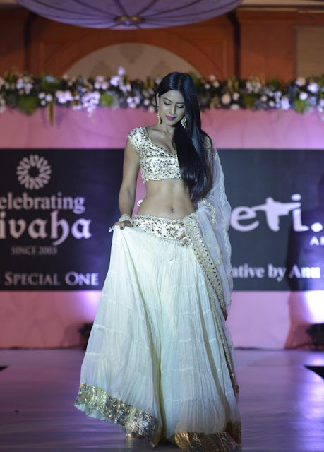 Nia Sharma in White Lehenga Choli at Beti show by Anu Ranjan