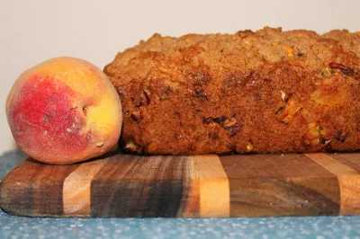 Loaf of peach and pecan streusel bread.