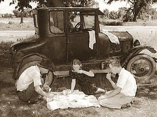 eatting dinner by old car,