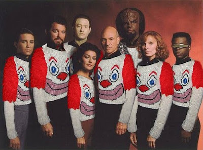 The entire cast of star trek TNG wearing horrible clown sweater