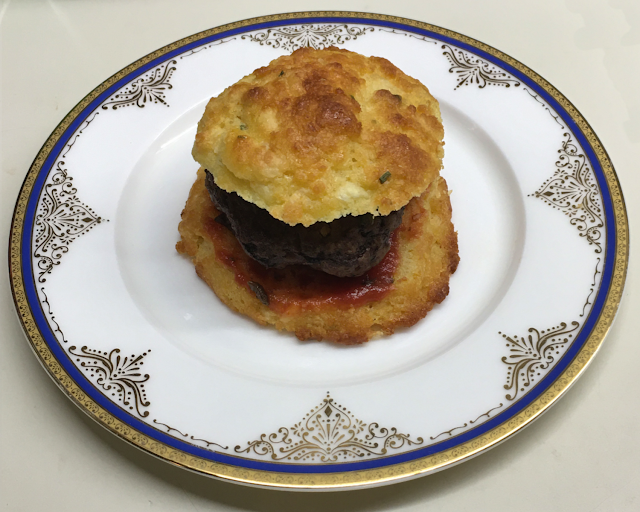 Hamburger on a keto cheddar cheese biscuit