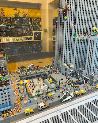 Lego store window with diorama of Rockefeller Center