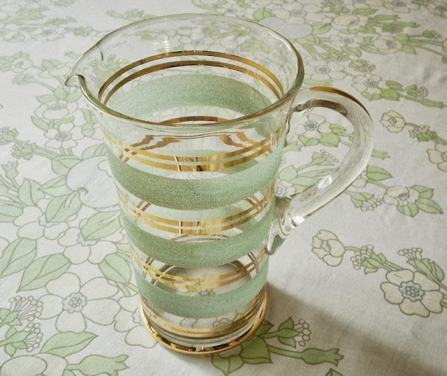 Vintage glass jug  in green and gold