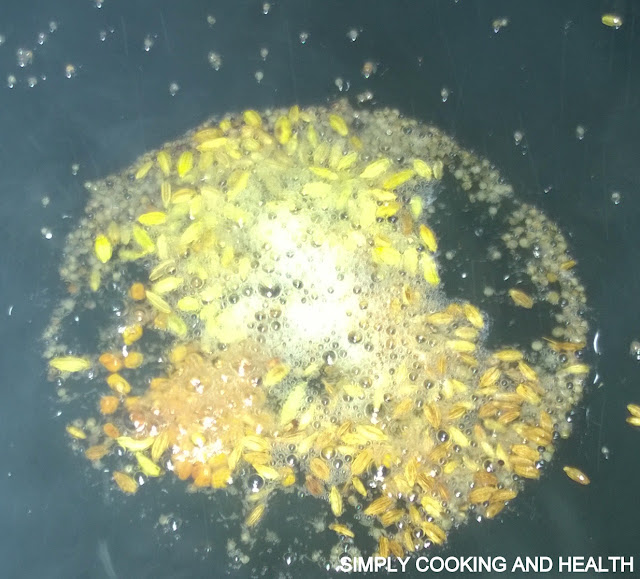 Frying mustard cumin ,fennel and fenugreek