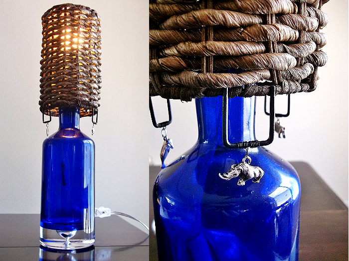 Blue glass upcycled bottle lamp made from an old liqour bottle. Safari style.