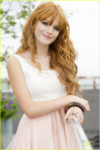 Bella Thorne Long Curly Hairstyle with Bangs