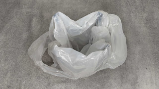 Holding onto a plastic bag