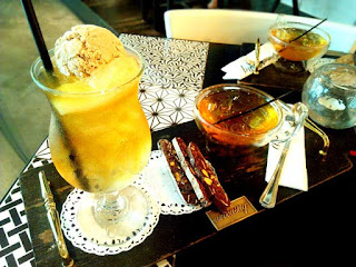 The Last Eunuch - pear tea float served on a tray with other frills.