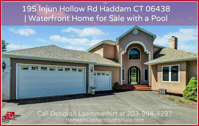 Delight in the spectacular views and top-notch features in this waterfront home for sale with a pool in Haddam CT!