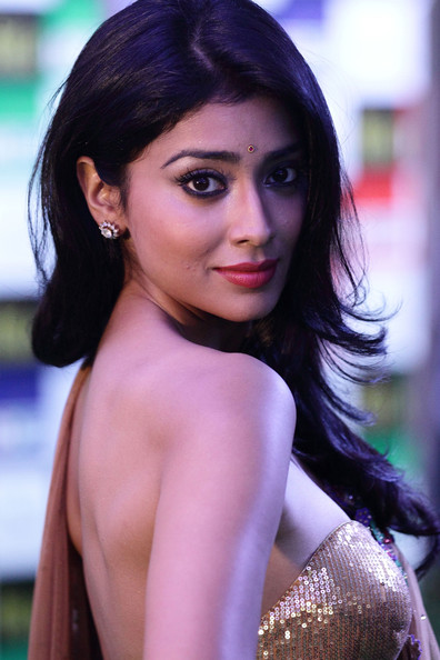 Actress Shriya Saran poses topless