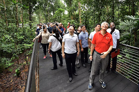 PM Lee and Mr Lawrence Wong, Minister for National Development and Second Minister for Finance, at the boardwalk at the SPH Walk of Giants in the Learning Forest of Singapore Botanic Gardens on March 31, 2017.