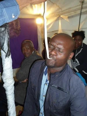  Pastor makes followers eat snake
