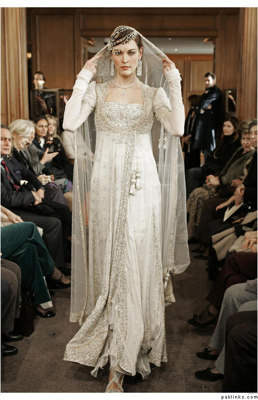 I'm rarely a fan of white wedding dresses simply because it is rare to see