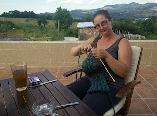 Relaxing on the balcony with a beer and some knitting