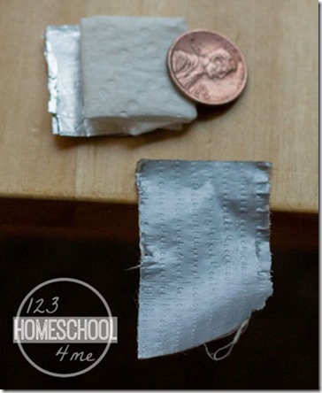 Rip-a-piece-of-duct-tape-to-tape-battery-together