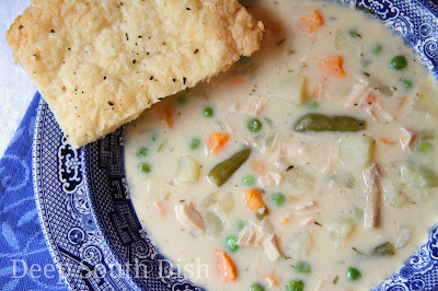 The elements and flavors from classic chicken pot pie - chopped chicken, potatoes, peas and carrots - in a creamy base - in an easy soup, with pie crust crackers for dipping.