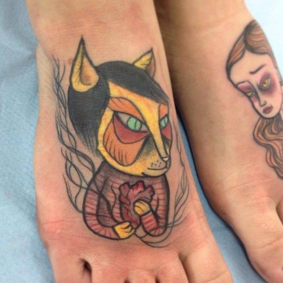 Coloured cat with heart tattoo on feet by Nicoz Balboa