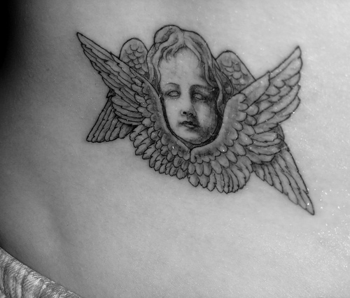 Most cherub tattoos are very pleasant and heavenly however some mix