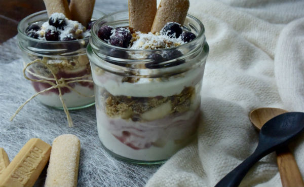 Healthy tiramisu for breakfast with oatmeal and berries Optimel Greek Style