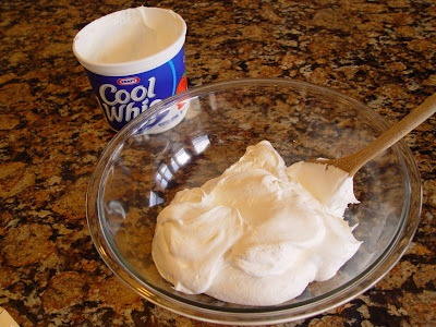 Place a thawed 12 ounces of cool whip into a large mixing bowl