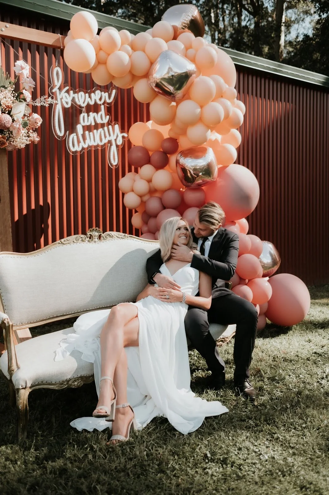 barefoot and soul photography balloon garand neon sign florals bridal gowns