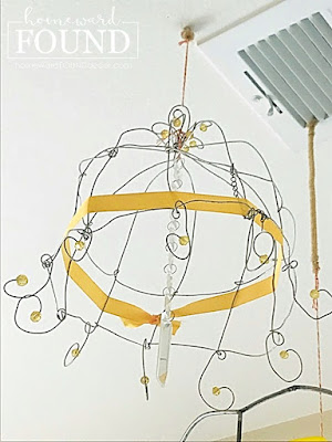 art,re-purposing,up-cycling,trash to treasure,salvaged,tomato cage crafts,DIY,diy decorating,decorating,colorful home,color,spring,seasonal,kinetic sculpture,mobile,ceiling mobile,wire lampshades,wire domes,wire mobile.