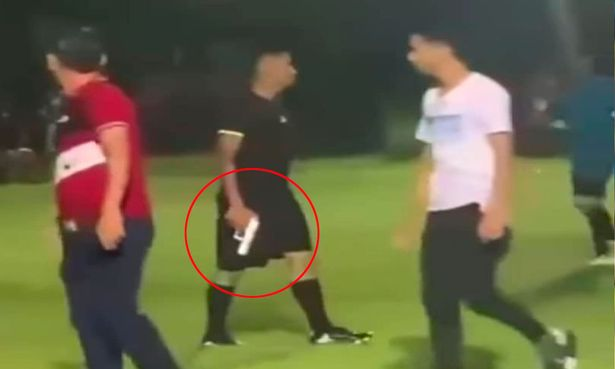 Funny And Scary Moment As Referee Pulls A Gun Out To Restore Order After Controversial Penalty Call (Photos)