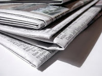 Picture of a stack of news papers