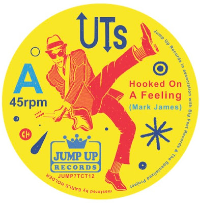 The picture disc artwork features an illustration of a rude boy playing a guitar and kicking one leg up in the air.