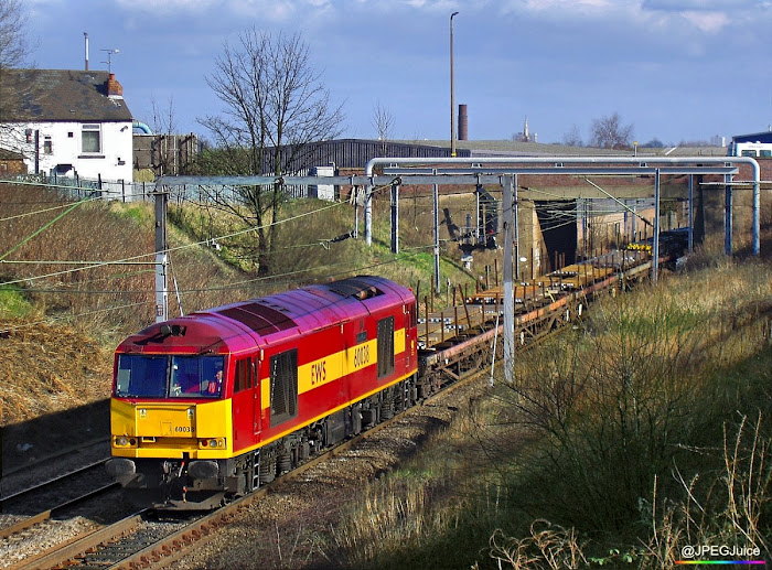 60038 in EWS red livery