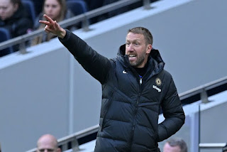 Graham Potter, the Chelsea coach, stands on the sideline during a Premier League match.