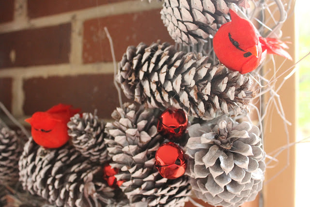 red bird and pinecone wreath