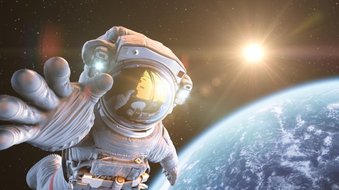 space-explorer man taking selfie on moon