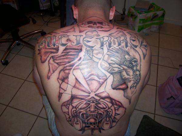Mayan themed back piece tattoo.