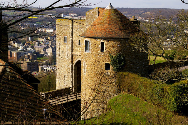 Built by King John and Henry III. Also known as Peverell's Gate, Peverell's Tower; Marshal's Tower, Beauchamp's Tower, and Bell Tower. An English Heritage Listed Building and Ancient Monument. Also visible: drawbridge and roof of the Georgian Sergeant Major's House.