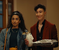 two women arriving at a party